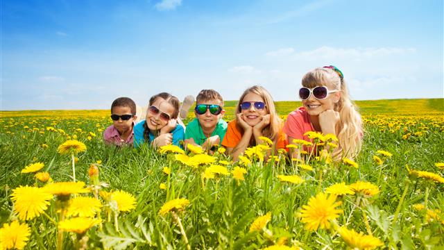 Diverse Children Laying Down in Meadow_iStock-478333657.jpg