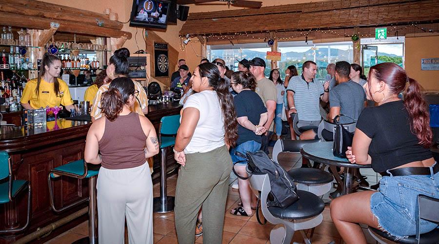 Crowd of people at bar